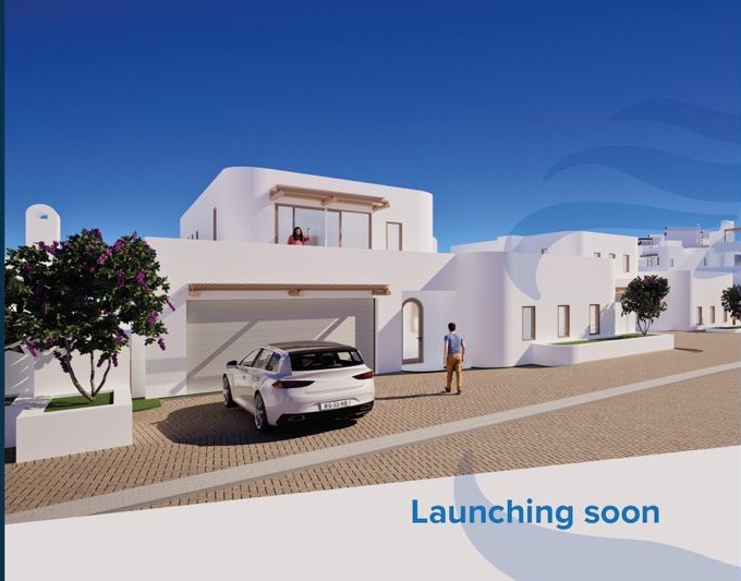 Whitewashed street elevation at Artemis, with timber pergolas and deep shade