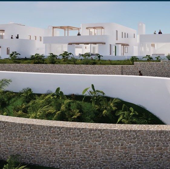 Stone terracing stepping down between the units at Artemis